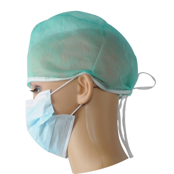 Disposable surgical cap with tie